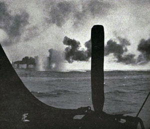 Third of a series of photographs taken from a British destroyer at the Battle of Jutland on 31st May 1916 showing salvos of German shells landing short of HMS Lion